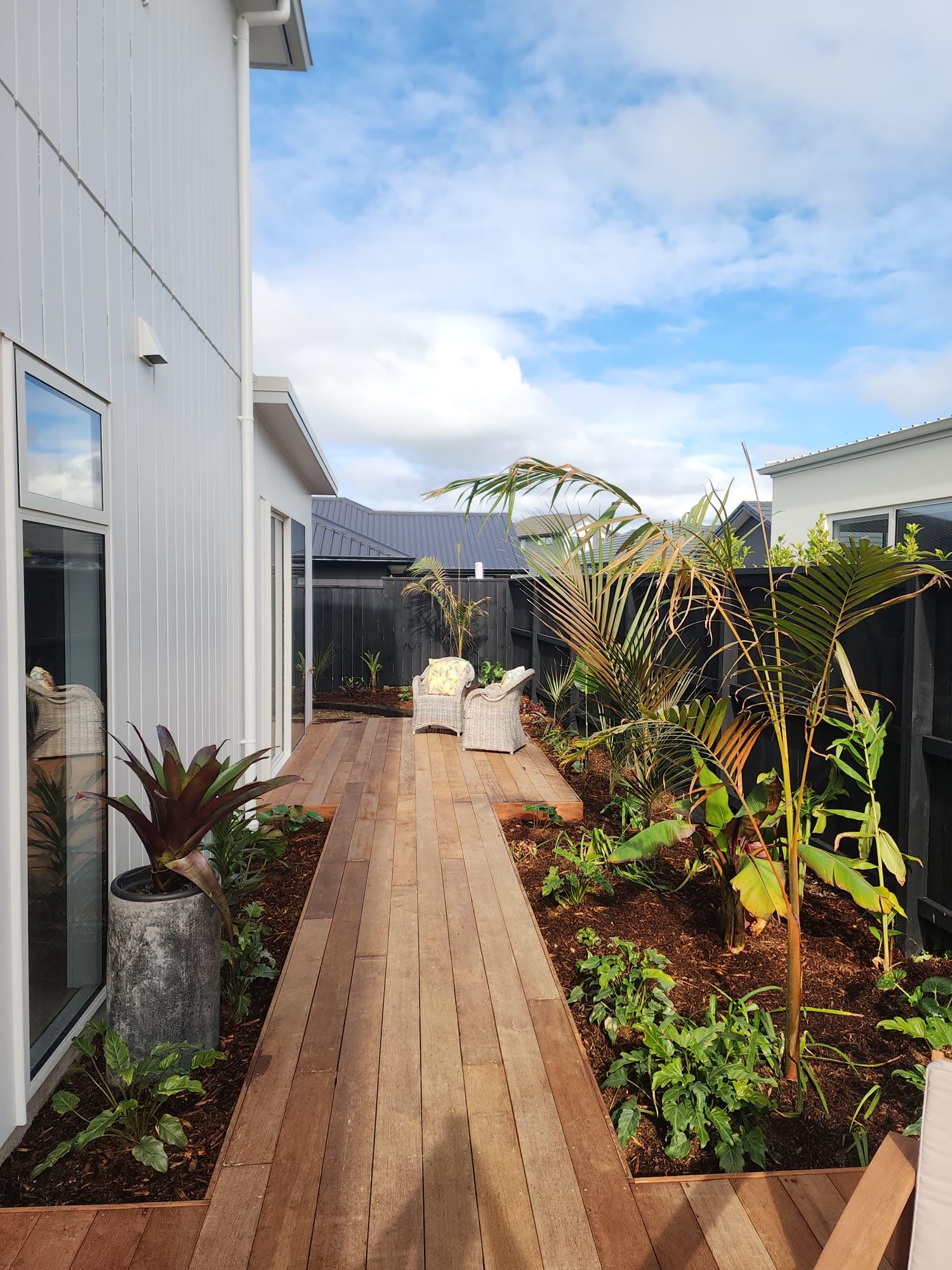 Narrow side garden boardwalk and planting: decking photo 09